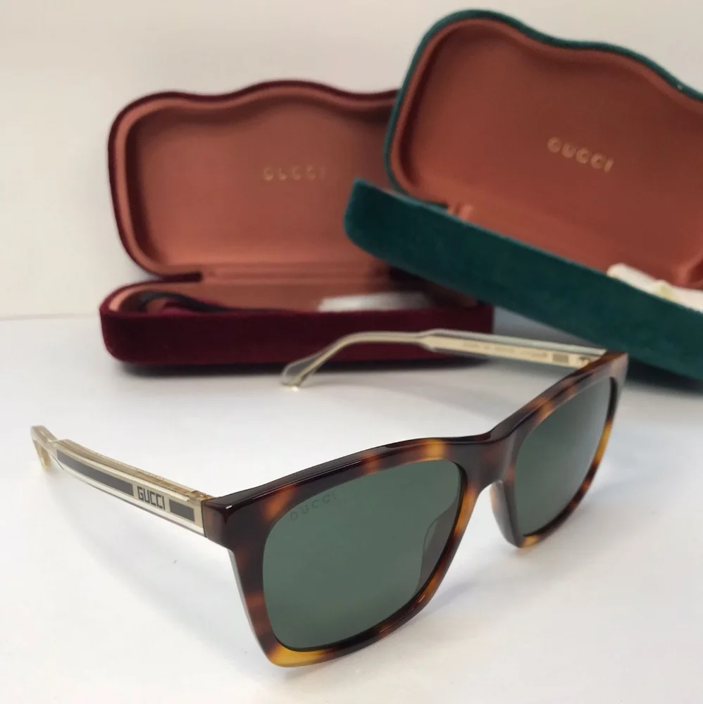 New - 💯 original Gucci Green Rectangular Men's Sunglasses GG0558S 003